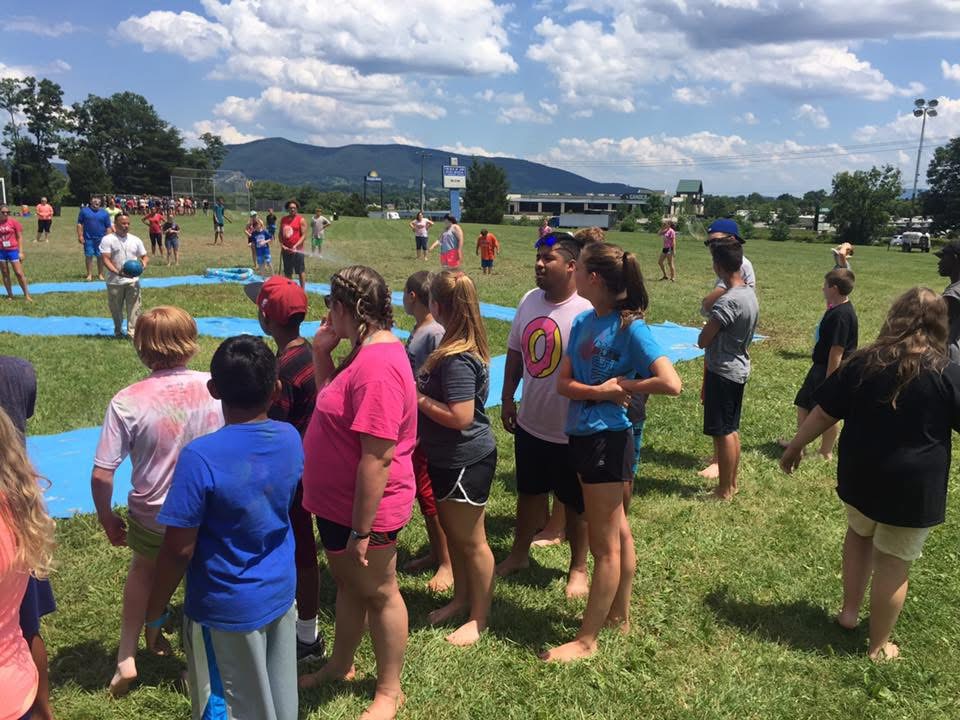 Summer camp participants on the field