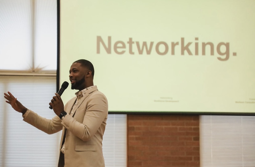 Xavier DeBrough presenting a networking session